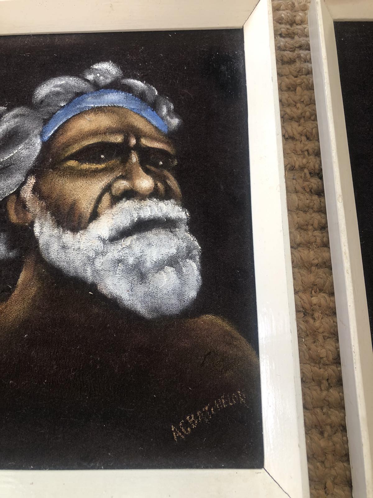 Pair of velvet paintings of indiginous subjects