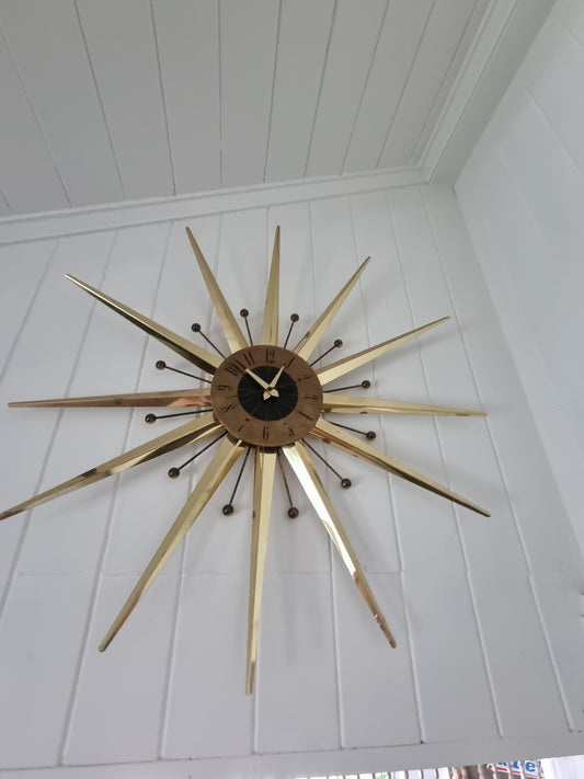 Large brass starburst clock