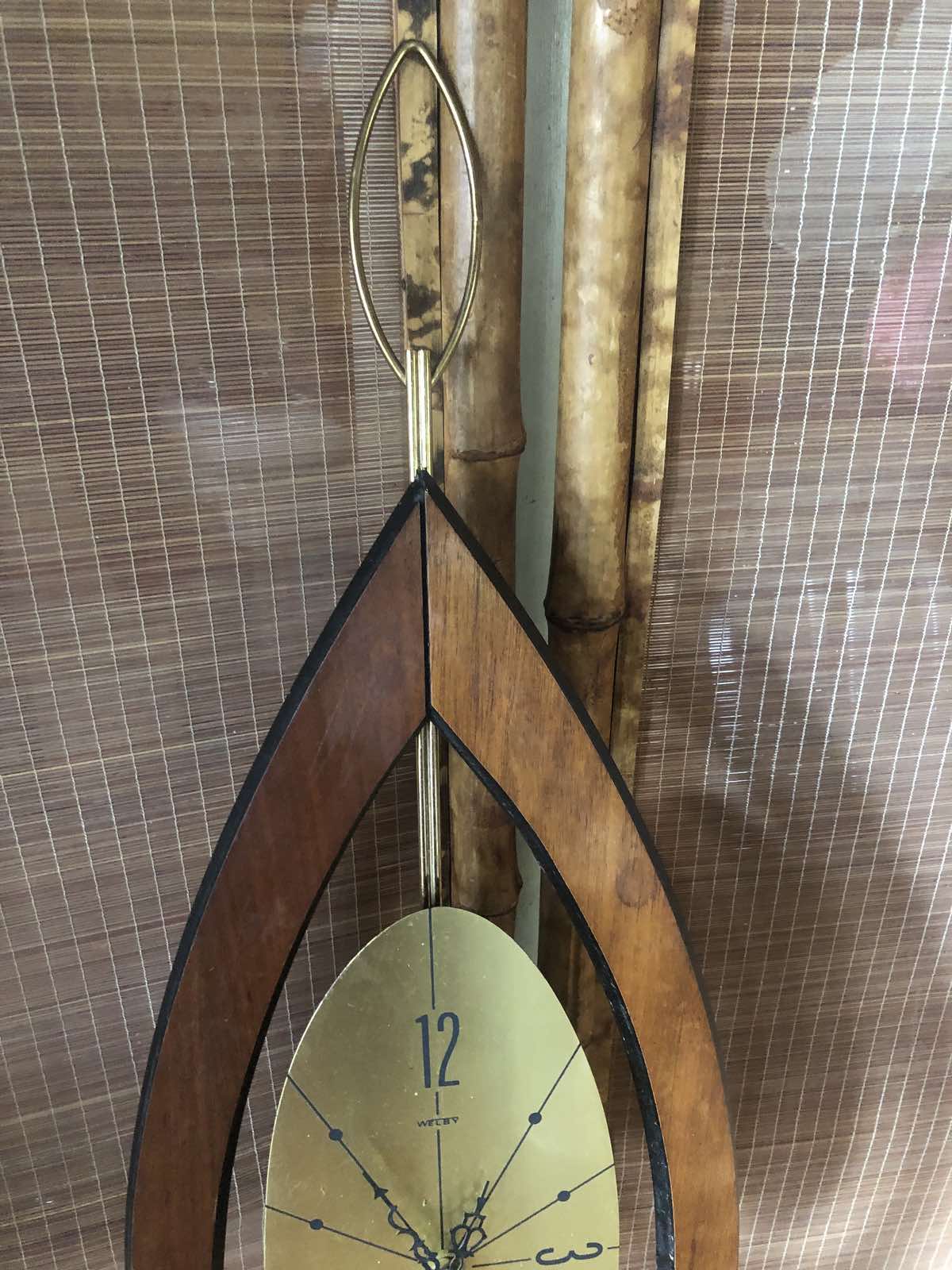 mid century teardrop wall clock