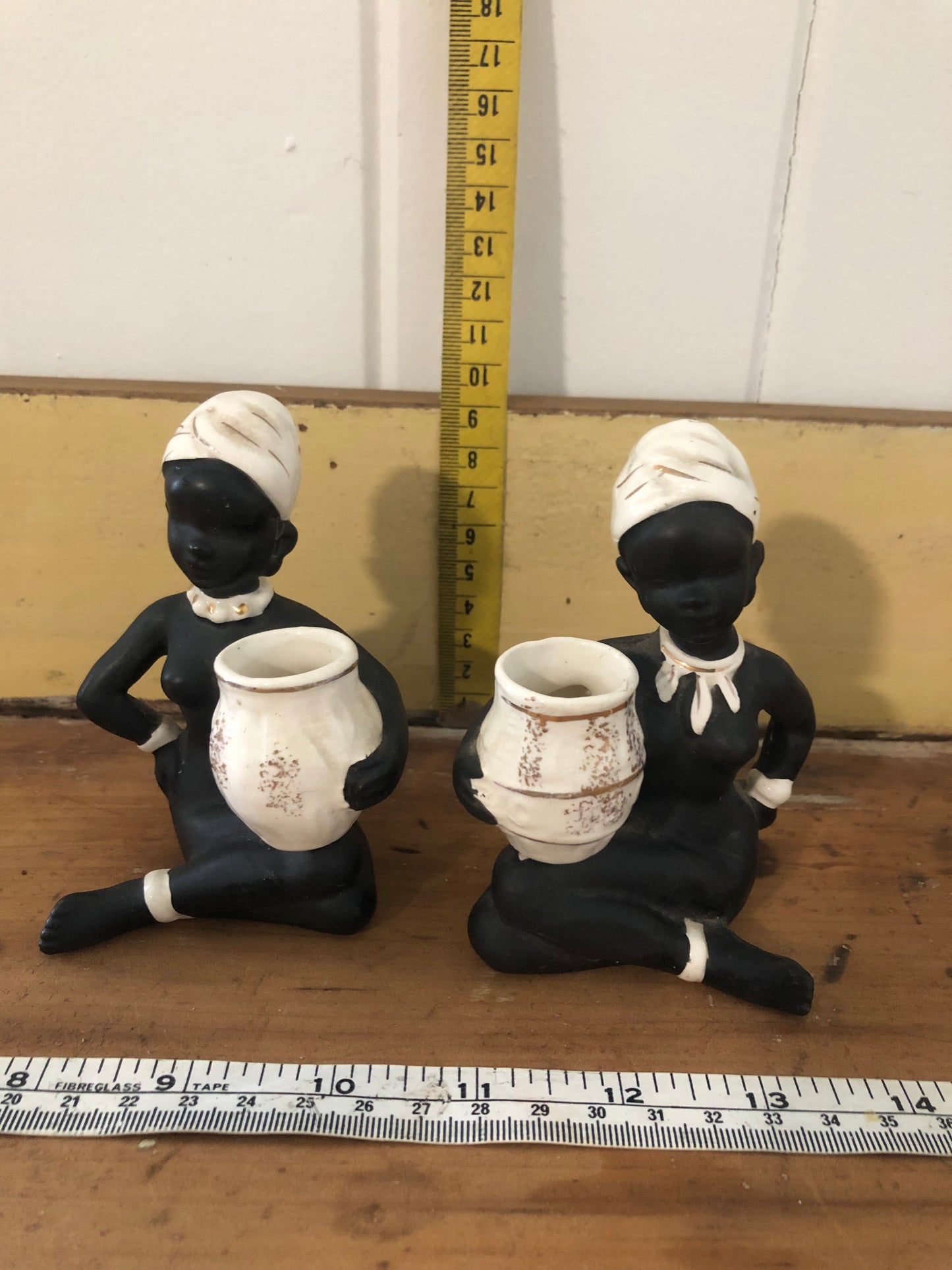 2 lady figures. Black